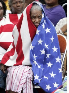 Poor Woman Wrapped in Flag